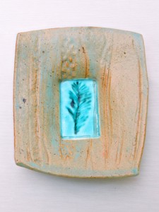 Stoneware dropped plate with shino and copper reduction glaze