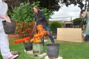 Jo putting the last of the pots into the reduction bins
