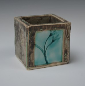 Small square porcelain box vase.