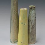 3 porcelain tube vases.