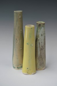 3 porcelain tube vases.