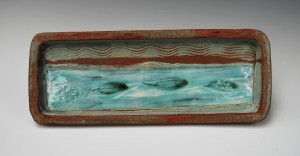 Wide oblong stoneware tray.